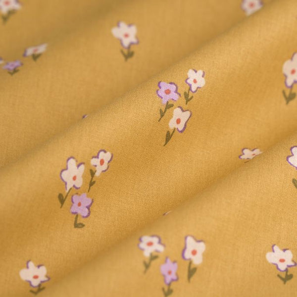 Bavoir fleuri jaune